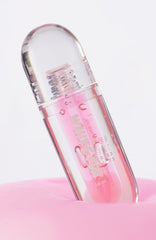 The Cosmetic Pouch & Lip Oil